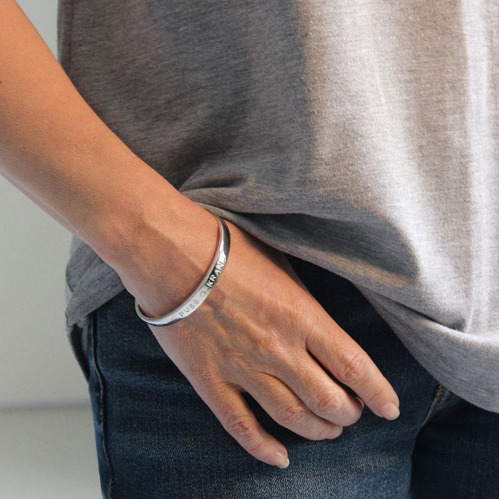 Armband med puss o kram